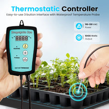 Load image into Gallery viewer, Thermostatic controller with digital display held over a tray of seedlings, set against a light blue background.
